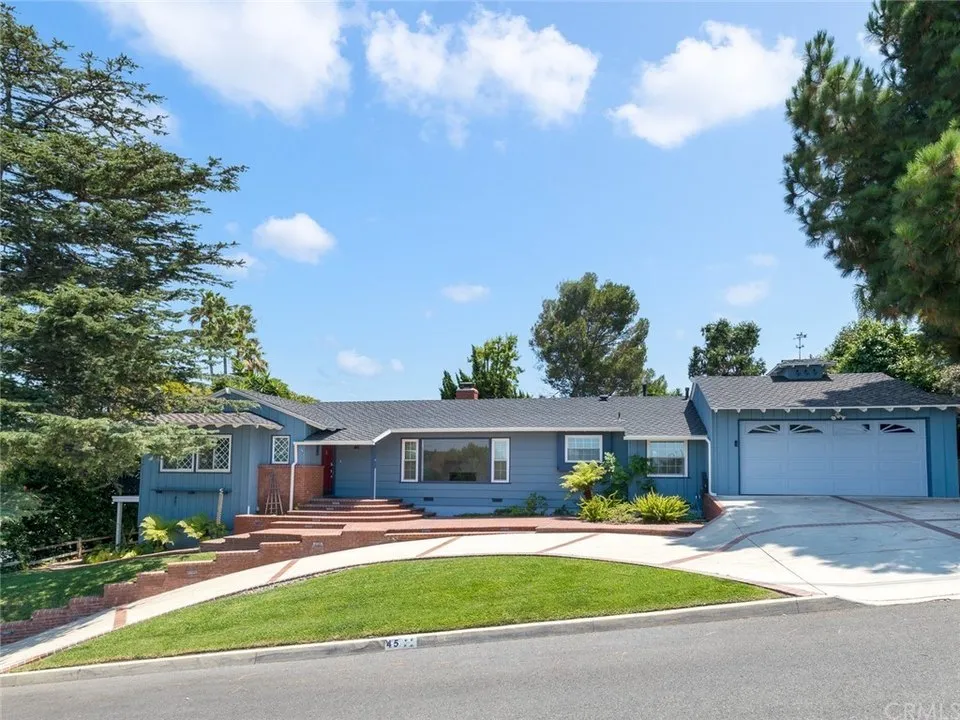 Front view of a luxury house with garage in California.